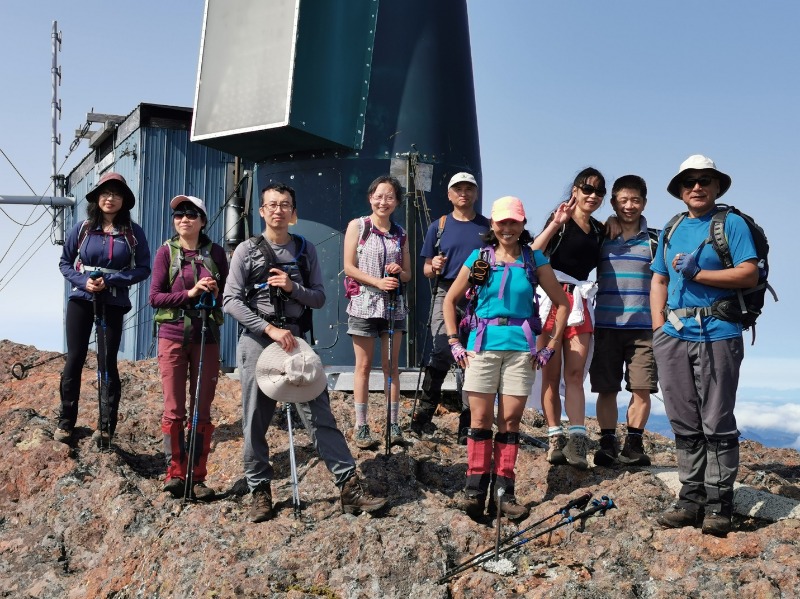 A group of people posing for a photo

Description automatically generated with medium confidence